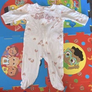 Carter’s onsie 6 month old. white colour with rainbow print. says little sister